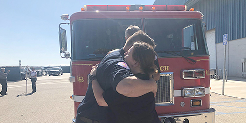 Jeannine Pearce with Long Beach Fireman